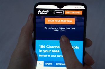 An image featuring FuboTV on phone concept