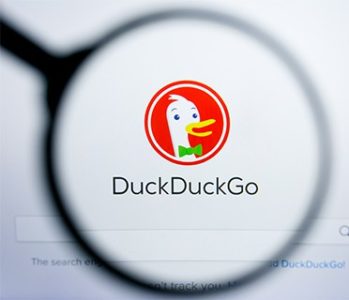 an image with DuckDuckGo browser shown through magnifying glass