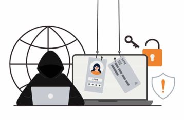 An image featuring a hacker using his laptop and accessing private data information