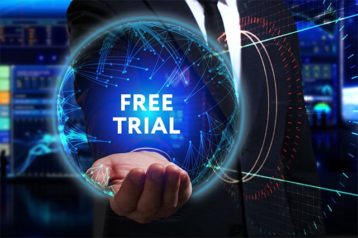 An image featuring person holding out his hand on free trial text concept