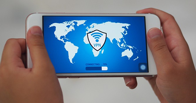 An image featuring a person connecting to a VPN server on his mobile phone concecpt