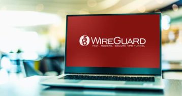 An image featuring a laptop that has the WireGuard text representing the WireGuard VPN protocol