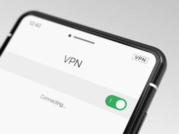 An image featuring a mobile phone that is connecting to a VPN connection concept