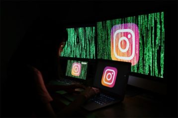 An image featuring a hacker hacking an Instagram account concept