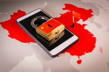An image featuring the Great Firewall of China concept with a phone and a lock on top of it