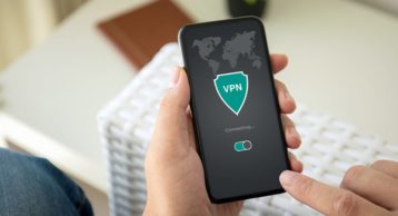 an image of a person using a phone to connect to a VPN