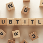Subtitle text on wooden cubes