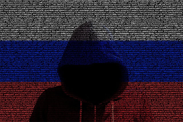 An image featuring a person in a hoodie representing a hacker with the russian flag in the background made in code