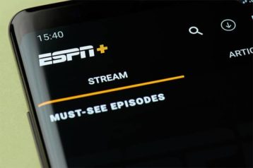 An image featuring a phone with the ESPN+ application opened