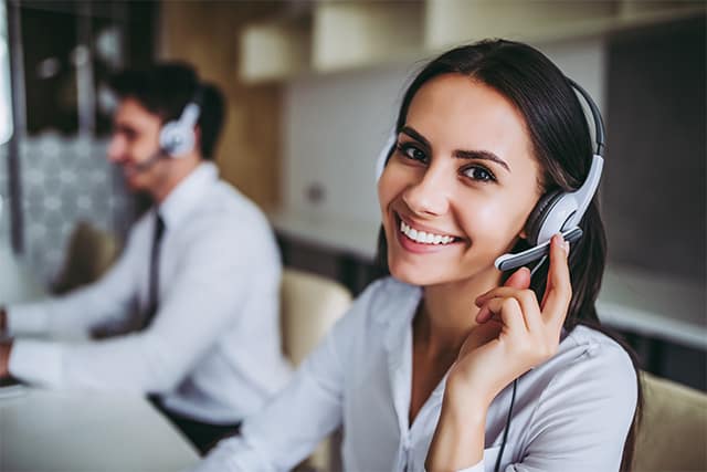 An image featuring two people being happy and doing their customer support job concept
