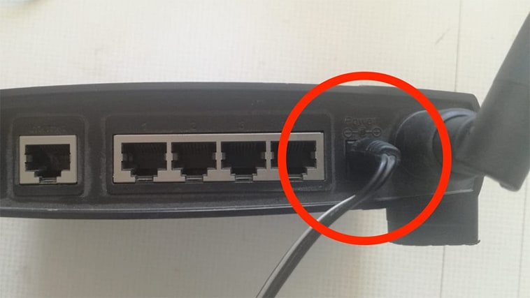 An image featuring a router that has highlighted the router cable representing which cable to pull out