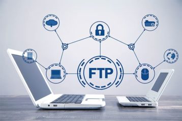An image featuring FTP file transfer protocol on laptop concept