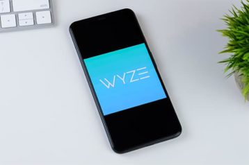 An image featuring Wyze app on phone