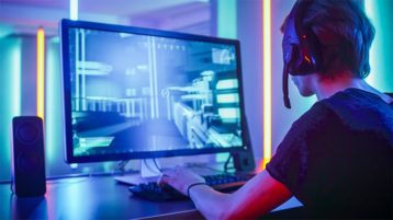 An image featuring a person playing a online video game representing online gaming concept