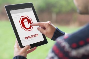 An image featuring a person that is using AD blocker concept