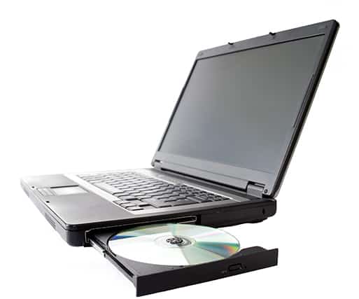 An image featuring a laptop with open CD disk drawer concept