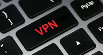 An image featuring red VPN key on keyboard concept