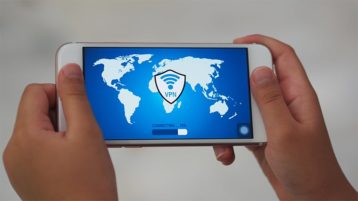 An image featuring a person using a safe VPN connection on his mobile phone concept