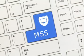 An image featuring MSS security key with blue color and a shield logo concept