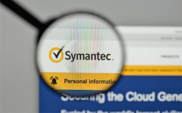 an image with Symantec homepage viewed via magnifying glass 