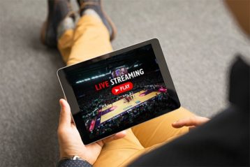 an image with person watching Basketball on Live Stream