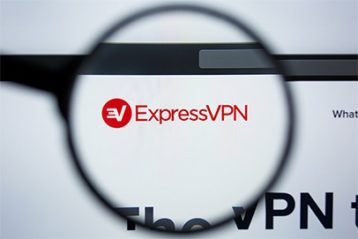 an image with ExpressVPN viewed through magnifying glass