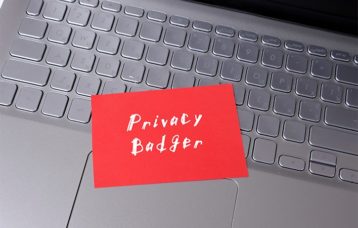 an image with Privacy badger note left on laptop keyboard