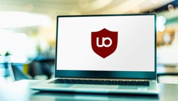 an image with uBlock Origin logo displayed on laptop 
