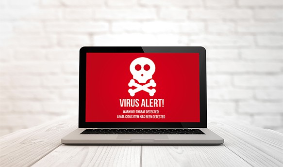 an image with Virus alert on laptop 