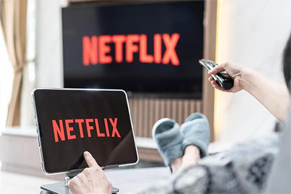 an image with Netflix connected on 2 devices 