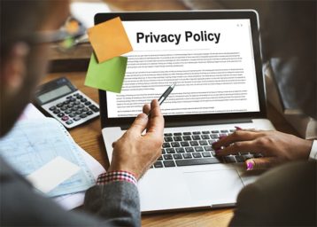 an image with Privacy Policies document opened on laptop