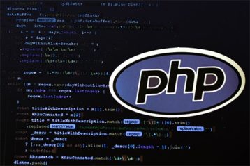 an image with PHP logo with codes in background 