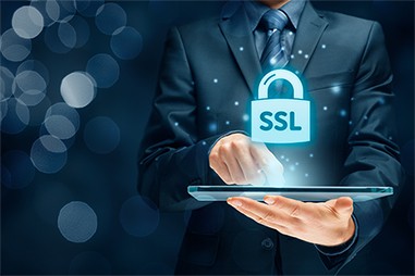 an image with SSL lockpad over tablet in businessman hand