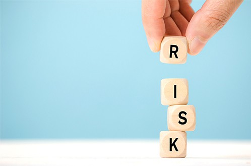 an image with risk written by cubes