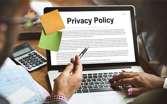 an image with privacy policy opened on laptop